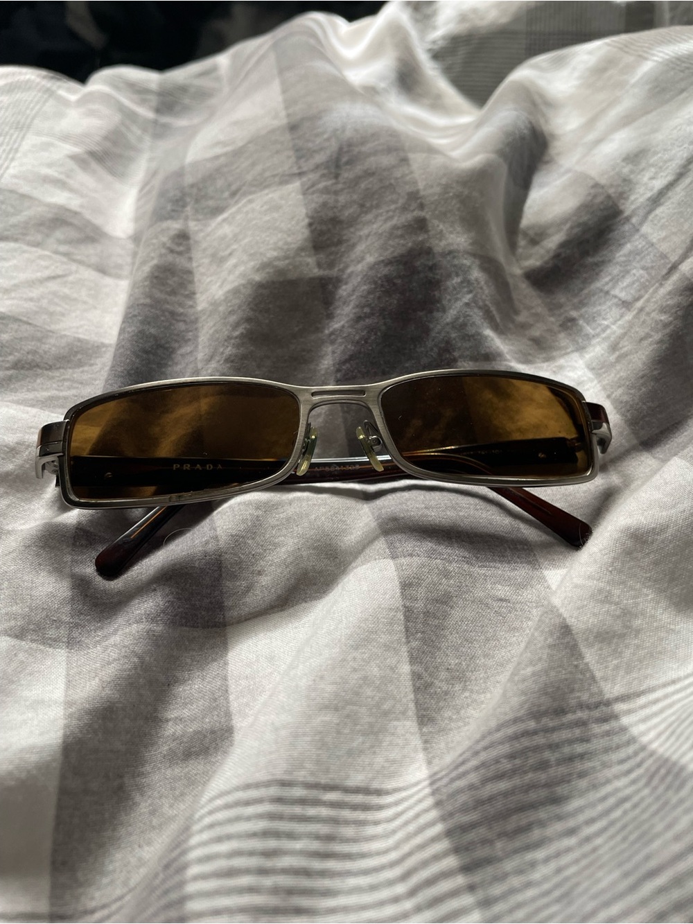 Prada Silver Frame Sunglasses with Brown Lenses